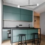 28-modern-sleek-matte-green-cabinets-in-a-muted-shade-with-black-framing-look-very-chic