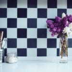 lilacs in a vase and kitchen utensils